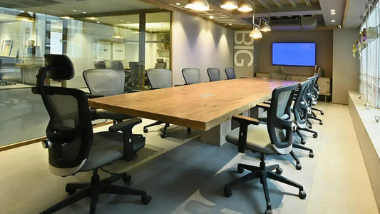 Modern conference room with rented tables and ergonomic chairs in a New Jersey business office.